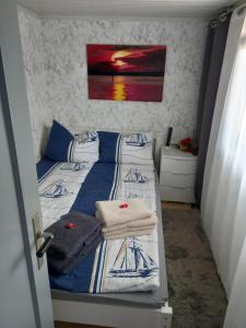 Postel nebo postele na pokoji v ubytování Ferienhaus am Weidenbaum
