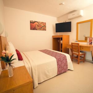 Postel nebo postele na pokoji v ubytování Hotel Klimt + 19 fotografií