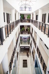 an overhead view of the lobby of a building at Hotel Abadia in Neiva +22 photos