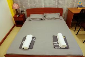 Postel nebo postele na pokoji v ubytování Yaarl Hostels