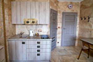 Kuchyň nebo kuchyňský kout v ubytování Apartamenty Gdynia City Center