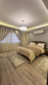 Cama o camas de una habitación en للعوائل فقط !!! مودرن دوبلكس فاخر جدا Luxury Modern Duplex in Cairo