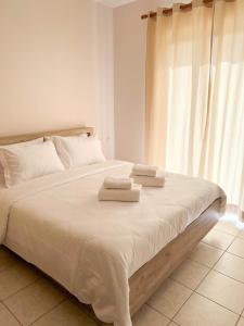 Postel nebo postele na pokoji v ubytování Clio City Center Apartments
