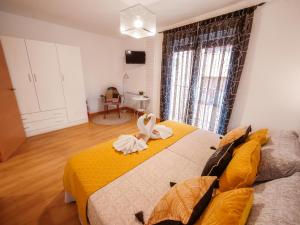 Postel nebo postele na pokoji v ubytování APARTAMENTOS ARGIA 2