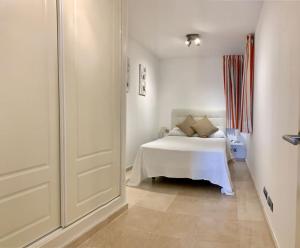 Postel nebo postele na pokoji v ubytování Apartamento Rocío + 37 fotografií