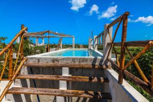 Bazén v ubytování La Casa de Mia Holbox nebo v jeho okolí