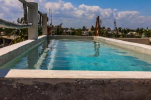 Bazén v ubytování La Casa de Mia Holbox nebo v jeho okolí