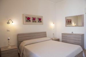 Letto o letti in una camera di B&B I Gerani