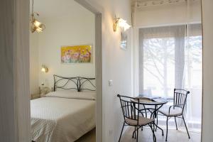 Letto o letti in una camera di B&B I Gerani