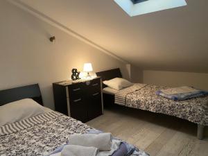 Voodi või voodid majutusasutuse Apartment Ivanišević 2 toas