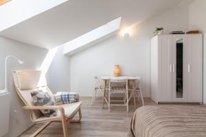 Ένα ή περισσότερα κρεβάτια σε δωμάτιο στο Lovely Nida Studio