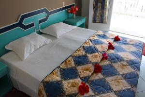 Кровать или кровати в номере Emira Hotel