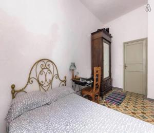 Łóżko lub łóżka w pokoju w obiekcie Erice Villa San Domenico
