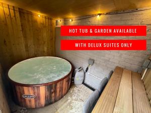 a hot tub and garden available with deluxe suites only at Osborne luxury hot tub and jacuzzi suites in Blackpool