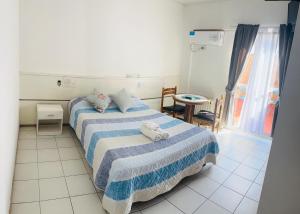 Postel nebo postele na pokoji v ubytování Portillo Apartments