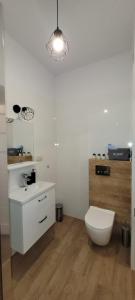 Kúpeľňa v ubytovaní Nest Apartament + 16 fotografií