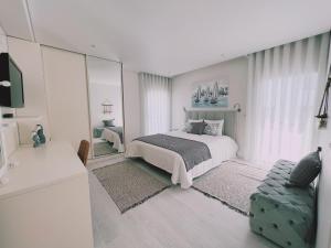 Кровать или кровати в номере Apartamento Brumar