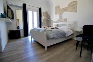 Voodi või voodid majutusasutuse B&B Belvedere All'Idria toas