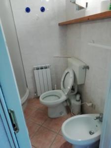Koupelna v ubytování La Terrazza nel carrùggio + 15 fotografií