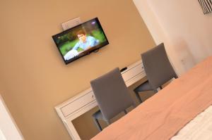 TV o dispositivi per l'intrattenimento presso Apartments Bojana