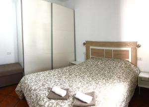 Postel nebo postele na pokoji v ubytování Primavera holiday apartment + 21 fotografií