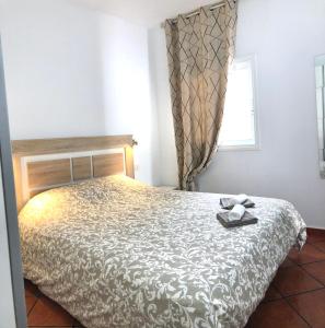 Postel nebo postele na pokoji v ubytování Primavera holiday apartment