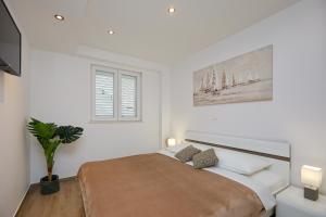 Cama o camas de una habitación en Hedera Estate, Hedera A38