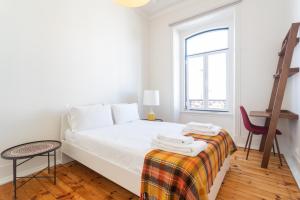 Кровать или кровати в номере Estrela Guesthouse