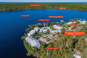 an aerial view of an island in a body of water at River Bend B212 in Welaka