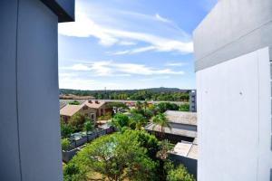a view of a city from a building at Unit 508 at Menlyn Place in Pretoria