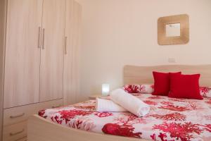 A bed or beds in a room at BluRiva Hotel