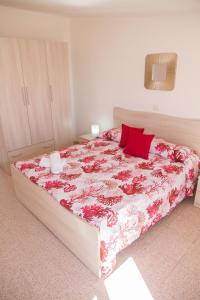 A bed or beds in a room at BluRiva Hotel