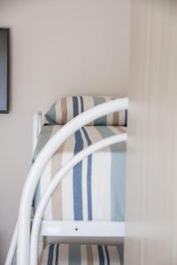A bed or beds in a room at BluRiva Hotel