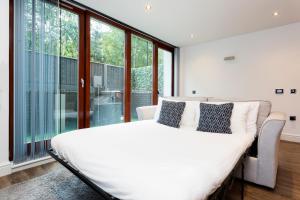 Ένα ή περισσότερα κρεβάτια σε δωμάτιο στο Park View Apartments