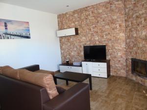 TV a/nebo společenská místnost v ubytování Casa rural Ajolí