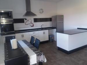 Kuchyň nebo kuchyňský kout v ubytování Casa rural Ajolí