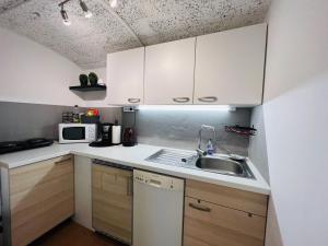 Kuchyňa alebo kuchynka v ubytovaní Apartment Ausseerland - willkommen bei Freunden