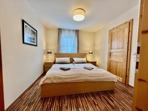 Posteľ alebo postele v izbe v ubytovaní Apartment Ausseerland - willkommen bei Freunden