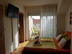 Fotografie z fotogalerie ubytování Apartments Hausmann v Novalji