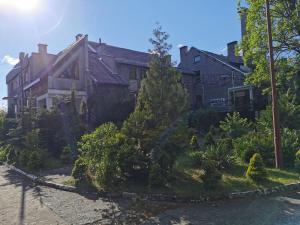 a house with a garden in front of it at DUKAT in Horyniec Zdrój