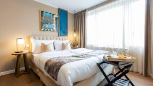 Giường trong phòng chung tại Delphi Hotel & Restaurant