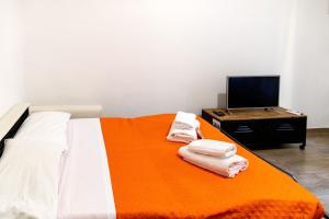 Posteľ alebo postele v izbe v ubytovaní Sannio Deluxe Apartment - San Giovanni + 27 fotografií