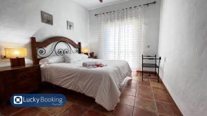 Ένα ή περισσότερα κρεβάτια σε δωμάτιο στο ZAHARA LUCKY BOOKING +20 φωτογραφίες
