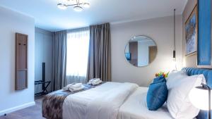 Giường trong phòng chung tại Delphi Hotel & Restaurant
