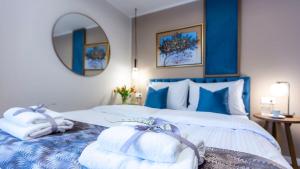 Giường trong phòng chung tại Delphi Hotel & Restaurant