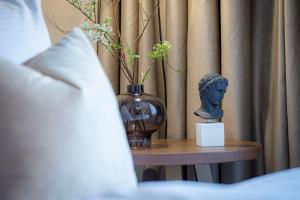 Giường trong phòng chung tại Delphi Hotel & Restaurant