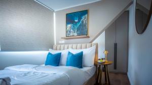 Giường trong phòng chung tại Delphi Hotel & Restaurant