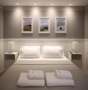 מיטה או מיטות בחדר ב-Posada Güemes BOUTIQUE