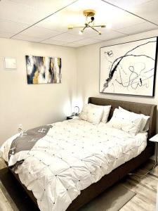 a bedroom with a large bed in a room at Luxury and cozy 1 Bed Condo in the heart of Providence in Providence