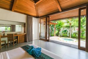 Letto o letti in una camera di Molokai Suites